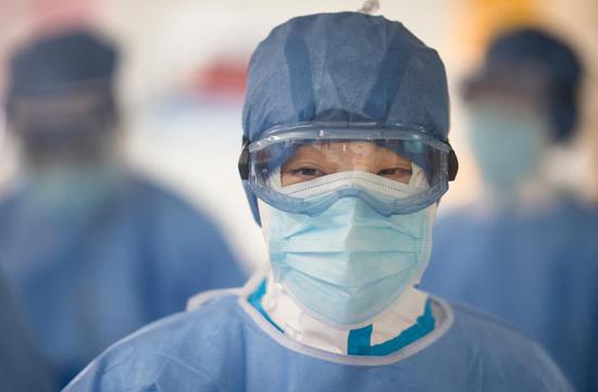 A nurse is seen at an ICU ward of the First Hospital of Wuhan City in Wuhan, central China's Hubei Province, Feb. 22, 2020. (Xinhua/Xiao Yijiu)