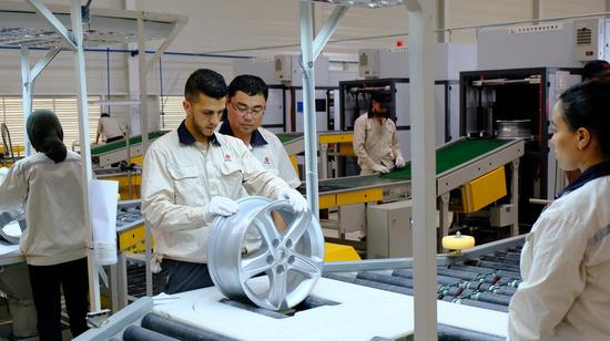 Staff members work at an aluminum wheel factory of the CITIC Dicastal Co., Ltd., at the Kenitra Atlantic Free Zone in Morocco's Kenitra on June 26, 2019. (Xinhua/Chen Binjie)