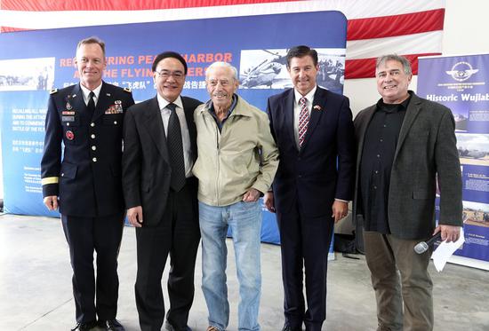 Harry Moyer (C), a 99-year-old veteran Flying Tigers member, pose for photos with Windsor Buzza (1st L), commanding general of the 91st Training Division of the U.S. Army Reserve, Wang Donghua (2nd L), Chinese Consul General in San Francisco, David Haubert (2nd R), mayor of Dublin city in the U.S. San Francisco Bay Area, and Jeffrey Greene, chairman of the Sino-American Aviation Heritage Foundation, during an event honoring contributions of Flying Tigers in World War II (WWII) in San Francisco, the United States, Dec. 7, 2019. (Xinhua/Wu Xiaoling)