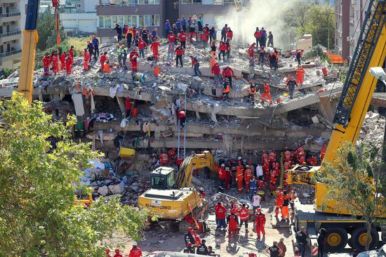 Rescuers work at a site of a collapsed building after an earthquake in Izmir province, Turkey, on Oct. 31, 2020. (Xinhua Photo)