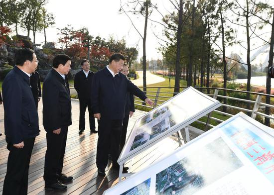 Chinese President Xi Jinping, also general secretary of the Communist Party of China Central Committee and chairman of the Central Military Commission, learns about environmental remediation along the Grand Canal, as well as the protection, inheritance and use of its culture while visiting an ecological and cultural park in Sanwan area of Yangzhou, east China's Jiangsu Province, Nov. 13, 2020. Xi on Friday inspected the city of Yangzhou during his tour in Jiangsu. (Xinhua/Xie Huanchi)