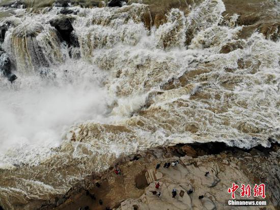 Spectacular winter scenery of Hukou Waterfall in Shanxi