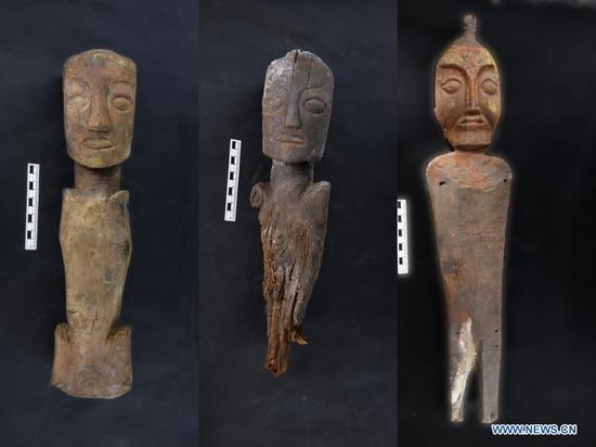 Undated file photo shows wooden figurines unearthed from the Sangmda Lungga tomb site in Zanda County, Ngari Prefecture, in the western part of the Tibet Autonomous Region.(Xinhua)