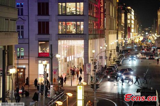 Customers pack Germany’s top bookstore before lockdown