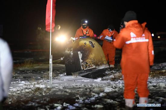 The return capsule of China's Chang'e-5 probe lands in Siziwang Banner, north China's Inner Mongolia Autonomous Region, on Dec. 17, 2020.  (Xinhua/Lian Zhen)