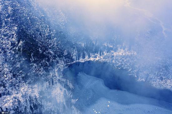 Snowfall turns Longchi National Forest Park into winter wonderland