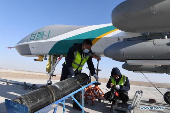Technicians prepare large UAV, Ganlin-1, meaning 
