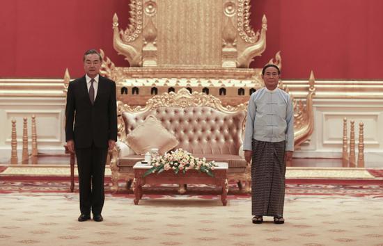 Myanmar President U Win Myint (R) meets with visiting Chinese State Councilor and Foreign Minister Wang Yi (L) in Nay Pyi Taw, Myanmar on Jan. 11, 2021. (Xinhua/Zhang Dongqiang)