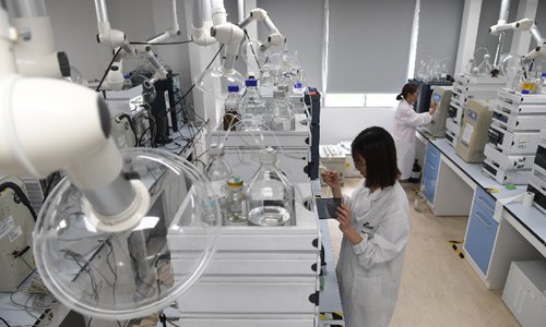 A staff member of a pharmaceutical company assesses the quality of a medical product in Nanjing, east China's Jiangsu Province, June 24, 2019. (Xinhua/Ji Chunpeng)