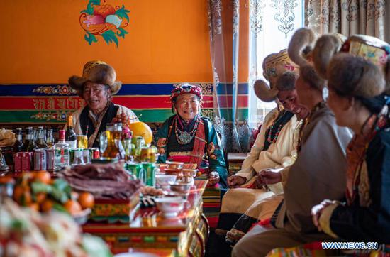 Tibetan villagers celebrate farmers' New Year in new homes