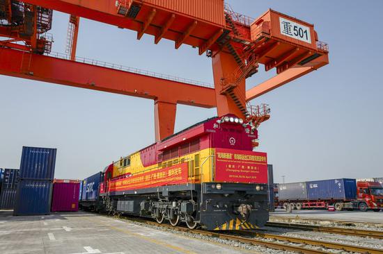 The land-sea freight train of the New International Land-Sea Trade Corridor heading for Indonesia waits to depart in southwest China's Chongqing, April 26, 2019. (Xinhua/Liu Chan)