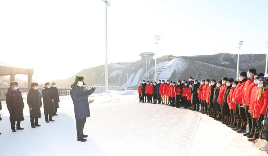 President Xi Jinping speaks to athletes, coaches and staff members at the Zhangjiakou competition zone of the Beijing 2022 Olympic and Paralympic Winter Games while visiting the National Biathlon Center in north China's Hebei Province, Jan. 19, 2021. (Xinhua/Wang Ye)