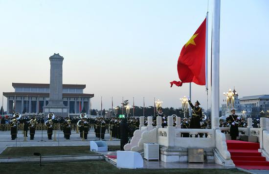 A grand national flag-raising ceremony is held as part of the celebrations for the New Year's Day at the Tian'anmen Square in Beijing, capital of China, Jan. 1, 2021. (Xinhua/Ren Chao)