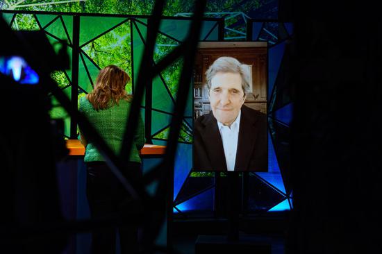 Photo taken in The Hague, the Netherlands, on Jan. 25, 2021 shows a screen displaying U.S. Special Presidential Envoy for Climate John Kerry delivering a speech at the Climate Adaptation Summit 2021 via video link.(CAS/Handout via Xinhua)