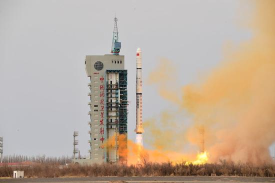 A Long March-4C rocket carrying the third group of China's Yaogan-31 remote sensing satellites blasts off from the Jiuquan Satellite Launch Center in northwest China, Feb. 24, 2021. (Photo by Wang Jiangbo/Xinhua)