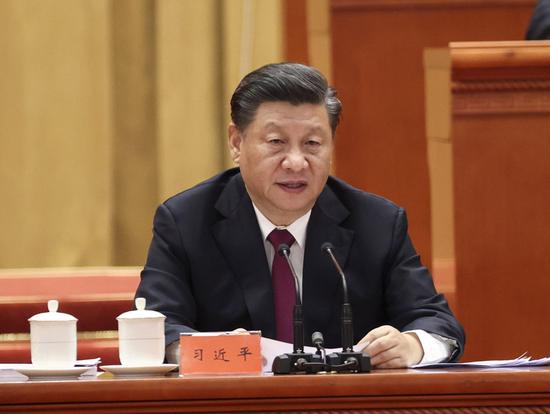 President Xi Jinping addresses a grand gathering marking the nation's poverty alleviation accomplishments at the Great Hall of the People in Beijing on Feb 25, 2021. (FENG YONGBIN/CHINA DAILY)