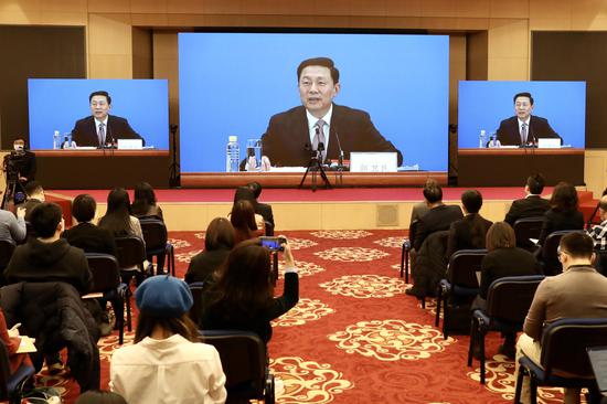 Guo Weimin, spokesperson of the fourth session of the 13th CPPCC National Committee, speaks during a news conference via video link in Beijing on March 3, 2021. (Photo by Zhu Xingxin/chinadaily.com.cn)