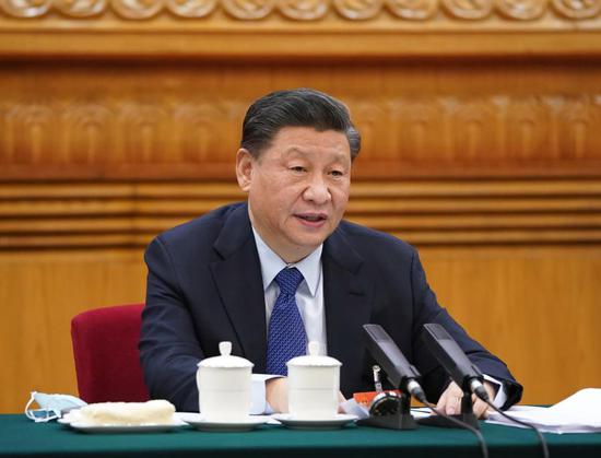 Chinese President Xi Jinping, also general secretary of the Communist Party of China Central Committee and chairman of the Central Military Commission, takes part in a deliberation with lawmakers from Qinghai Province, at the fourth session of the 13th National People's Congress in Beijing, capital of China, March 7, 2021. (Xinhua/Li Xueren)