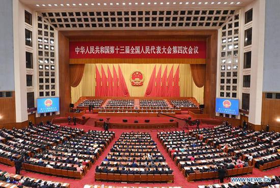 The closing meeting of the fourth session of the 13th National People's Congress (NPC) is held at the Great Hall of the People in Beijing, capital of China, March 11, 2021. (Xinhua/Jin Liangkuai)