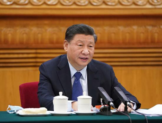President Xi Jinping, also general secretary of the Communist Party of China Central Committee and chairman of the Central Military Commission, takes part in a deliberation with lawmakers from Qinghai province, at the fourth session of the 13th National People's Congress in Beijing, March 7, 2021. (Photo/Xinhua)