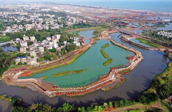 Aerial photo taken on Nov. 6, 2020 shows an ecological restoration project along Furong River at Jiangdong New Area in Haikou, south China's Hainan Province. (Xinhua/Guo Cheng)