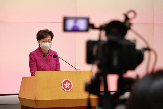 Chief Executive of the Hong Kong Special Administrative Region (HKSAR) Carrie Lam attends a press conference in Hong Kong, south China, March 23, 2021. (Xinhua/Lui Siu Wai)