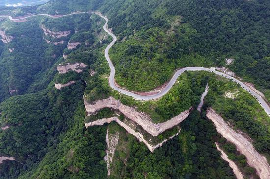 Aerial photo taken on June 18, 2019 shows a road in Wuxiang County of north China's Shanxi Province. (Xinhua/Zhan Yan)