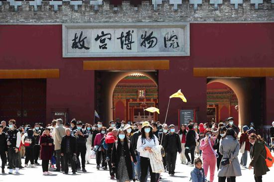 People visit the Palace Museum in Beijing on April 3, 2021. (Photo/IC)