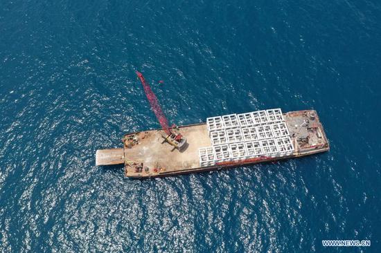 Aerial photo taken on April 8, 2021 shows artificial reefs being placed in Wuzhizhou Island's marine ranch in Sanya, south China's Hainan Province. (Wuzhizhou Island's marine ranch/Handout via Xinhua)