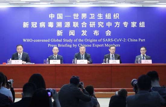 Chinese expert members of a WHO-China joint team introduce the report on the WHO-convened global study of COVID-19 origins at a press briefing in Beijing, capital of China, March 31, 2021. (Xinhua/Zhang Yuwei)