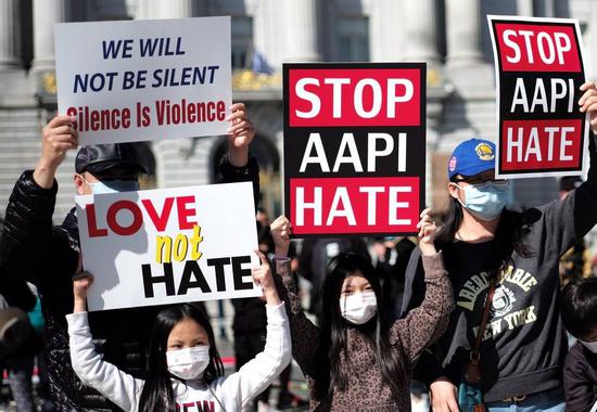 People take part in a rally against racism and violence against Asian Americans at city hall in San Francisco, the United States, March 27, 2021. (Xinhua/Wu Xiaoling)