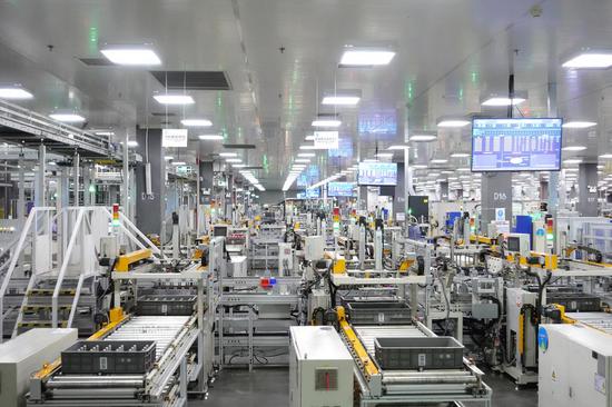 Photo taken on April 1, 2021 shows a workshop of a microwave oven factory of Midea Group, a Chinese home appliance giant, in Foshan City, south China's Guangdong Province. (Xinhua/Li Jiale)