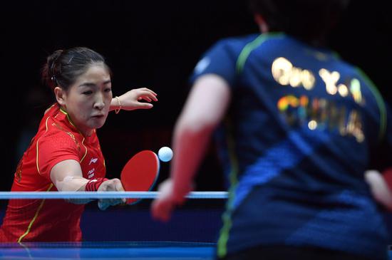 Liu Shiwen hits a return during the women's singles first round match against Guo Yuhan at the 2021 WTT (World Table Tennis) Grand Smashes Trials and Olympic Simulation in Xinxiang, central China's Henan Province, May 3, 2021. (Xinhua/Li Jianan)