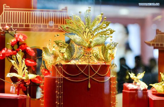 Personal decoration products displayed at consumer goods expo in Haikou