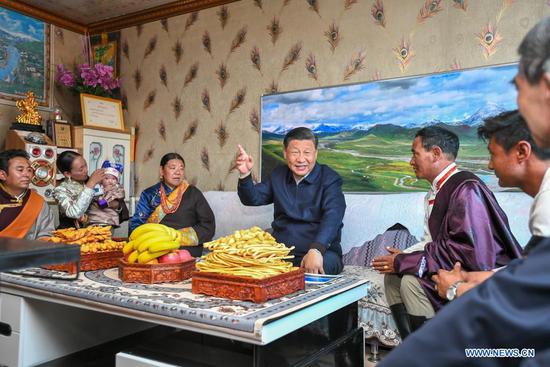 President Xi Jinping, also general secretary of the Communist Party of China Central Committee and chairman of the Central Military Commission, visits the home of a herdsman in a village in Shaliuhe township, Gangcha county in Haibei Tibetan autonomous prefecture, Northwest China's Qinghai province, June 8, 2021. Xi on Tuesday visited Gangcha county during his inspection tour of Qinghai province. (Photo/Xinhua)