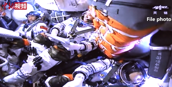 The photo taken on June 17, 2021 shows three Chinese astronauts are in the return module of Shenzhou-12 manned spaceship. 