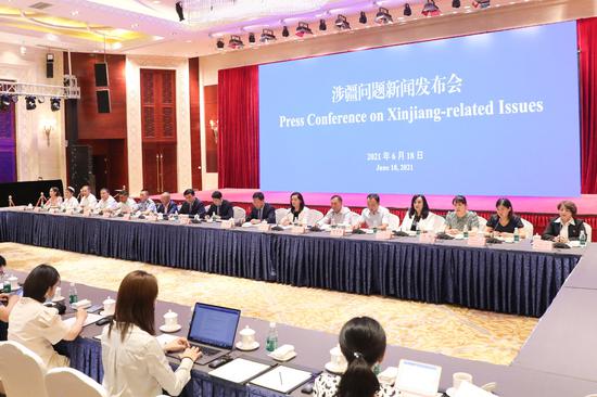 A news conference on Xinjiang-related issues is held in Beijing on June 18, 2021. (Photo/Xinhua)