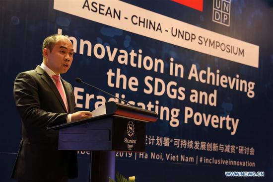 Kung Phoak, deputy secretary-general of ASEAN for the ASEAN Socio-Cultural Community, delivers a speech at the opening ceremony of the ASEAN-China-UNDP symposium in Hanoi, capital of Vietnam, Sept. 4, 2019. (Xinhua/Wang Di)