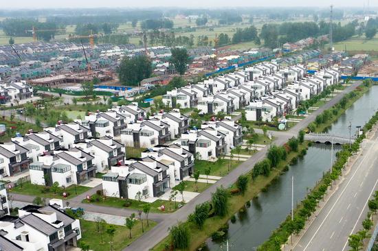 Aerial photo taken on May 11, 2020 shows residential houses built for farmers in Lyuliang Township of Jinhu County, east China's Jiangsu Province. (Xinhua/Li Bo)