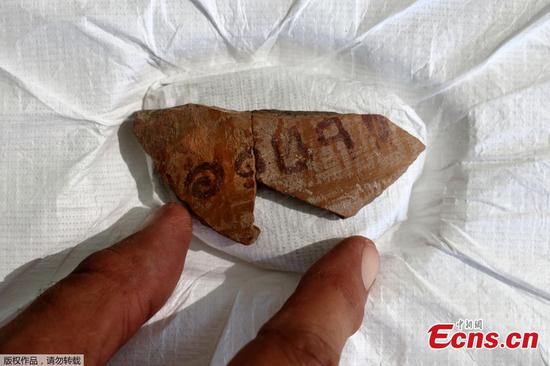 Israeli archaeologist finds 3,100-year-old pottery fragment