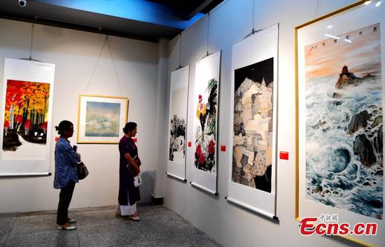 Overseas Chinese artists present art works at World Heritage Committee