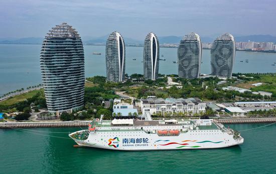An aerial photo shows a cruise ship at a port in Sanya, south China's Hainan Province. (Xinhua/Guo Cheng)
