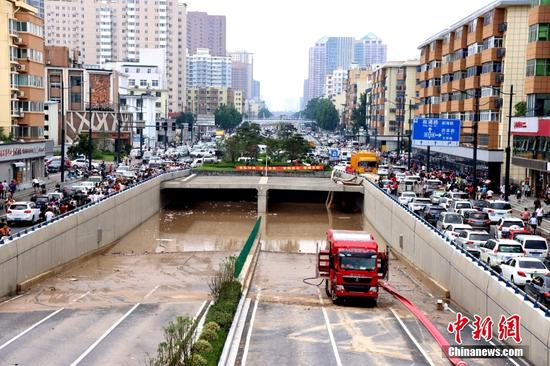 Central Chinese city suspends business, construction ahead of downpours. (Photo/ChinaNewsService)