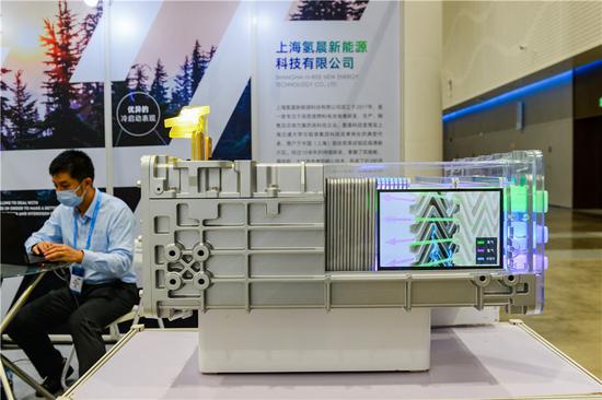 Model of fuel cell stack is on display at the World New Energy Vehicle Congress in Haikou, capital of South China's Hainan province, on Sept 15, 2021. (Photo/Xinhua)