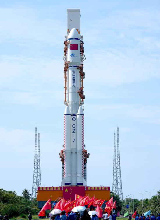 The Tianzhou 3 cargo spacecraft and its carrier－a Long March 7 rocket－are moved into position at the Wenchang Space Launch Center in Hainan province on Thursday. (China Daily/Su Dong)