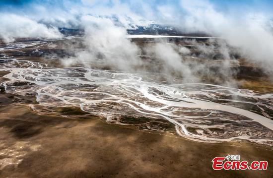 Tongtian River shrouded in clouds in China's Qinghai