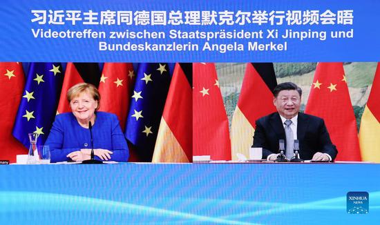 Chinese President Xi Jinping meets with German Chancellor Angela Merkel via video link in Beijing, capital of China, Oct. 13, 2021. (Xinhua/Liu Bin)