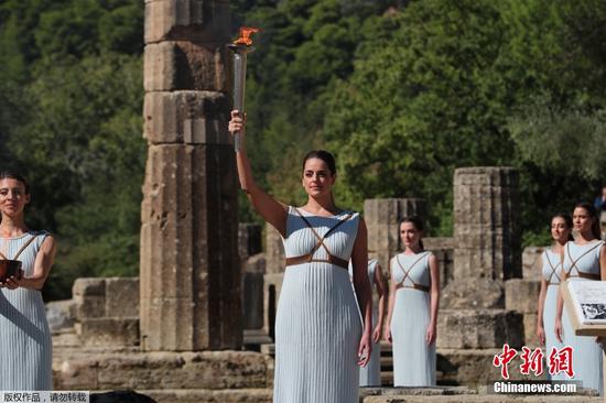 The Olympic Flame that will be burning for the Beijing 2022 Winter Games is ignited at the birthplace of the Games in Ancient Olympia, Greece, Oct. 18, 2021. (Photo/China News Service)