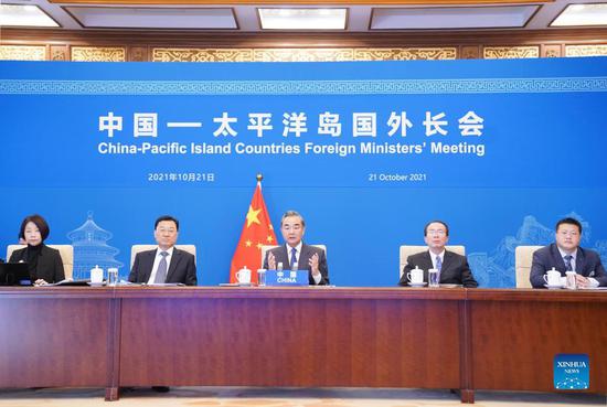 Chinese State Councilor and Foreign Minister Wang Yi chairs the first China-Pacific Island Countries Foreign Ministers' Meeting held via video link on Oct. 21, 2021. (Xinhua/Yan Yan)