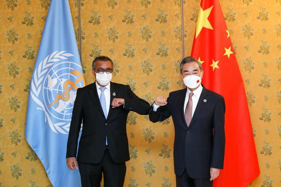 Chinese State Councilor and Foreign Minister Wang Yi meets with Director-General of the World Health Organization (WHO) Tedros Adhanom Ghebreyesus in Rome, Italy, Oct. 30, 2021. (Xinhua/Zhang Cheng)